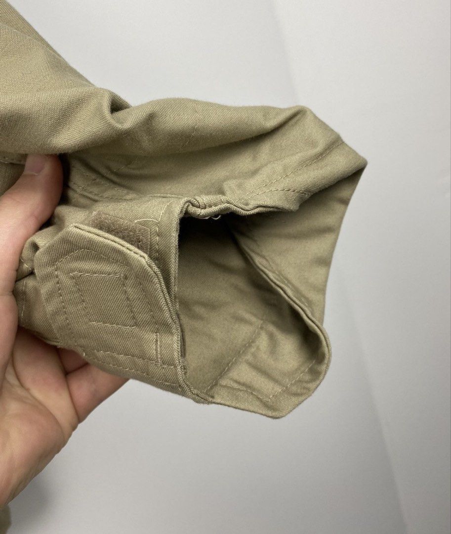 Teesar Inc. Khaki Military M65 Field Jacket (Category: Coats, Jackets and Outerwear) located in Quezon City. Submitted by freakface5 (Listing ID 1440766020, Image 3). Description: Chest. 23.03 inches Length. 31.89 inches Sleeve length. 26.57 Beige Brand: Teesar Inc. Fits small-medium NO ISSUES, can pass as brand new deadstock INCLUDES INNER LAYER! - Classic khaki field jacket - Multiple front pockets for storage - Button and zip closure - Conceal
