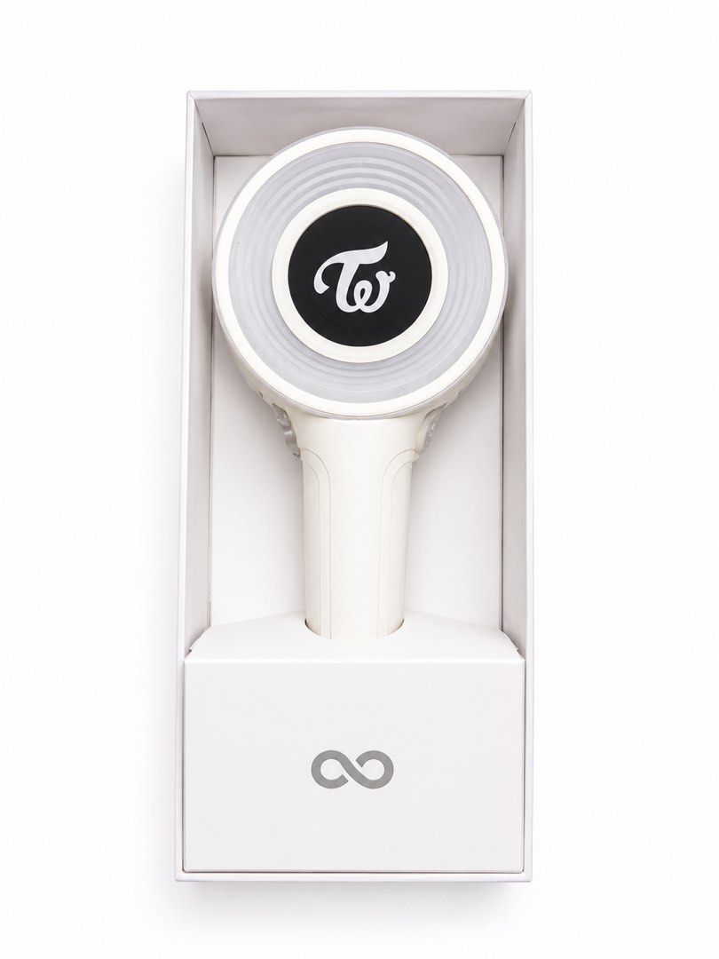 TWICE Candybong ∞ Lightstick Official Kpop Merchandise (Category: K-Wave Merchandise) located in Manila. Submitted by deklutterph (Listing ID 1440864310, Image 2). Description: - Official TWICE Candybong ∞ lightstick - Comes in original packaging - Includes quick start guide - Connects to app for light shows - Ideal for ONCE, concerts, and fan gatherings.