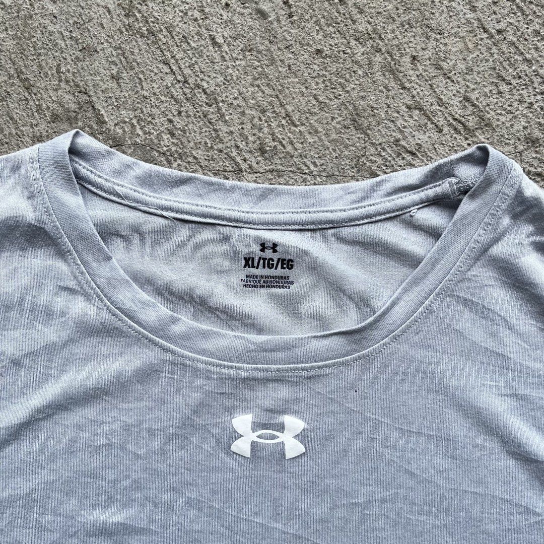 Under Armour Center Logo Shirt (Category: Tshirts & Polo Shirts ) located in Batangas. Submitted by _thriftxplug (Listing ID 1440801253, Image 2). Description: Under Armour Mid Logo Shirt Size: XL Width 25 x 28 - 29 Length No issue Excellent condition Grab: ₱299.