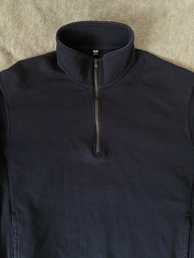 Uniqlo Navy Blue Half Zip Sweatshirt (Category: Coats, Jackets and Outerwear) located in Barili. Submitted by macheyzhackiel (Listing ID 1440776627, Image 2). Description: - Uniqlo Half Zip Sweatshirt - Color: Navy Blue - Material: Comfortable Cotton Blend - Features: Side Pockets - Versatile: Great for layering or wearing solo - Style: Easy to pair with casual outfits.