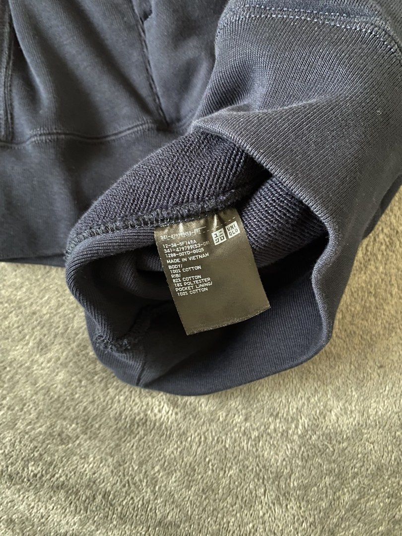 Uniqlo Navy Blue Half Zip Sweatshirt (Category: Coats, Jackets and Outerwear) located in Barili. Submitted by macheyzhackiel (Listing ID 1440776627, Image 3). Description: - Uniqlo Half Zip Sweatshirt - Color: Navy Blue - Material: Comfortable Cotton Blend - Features: Side Pockets - Versatile: Great for layering or wearing solo - Style: Easy to pair with casual outfits.
