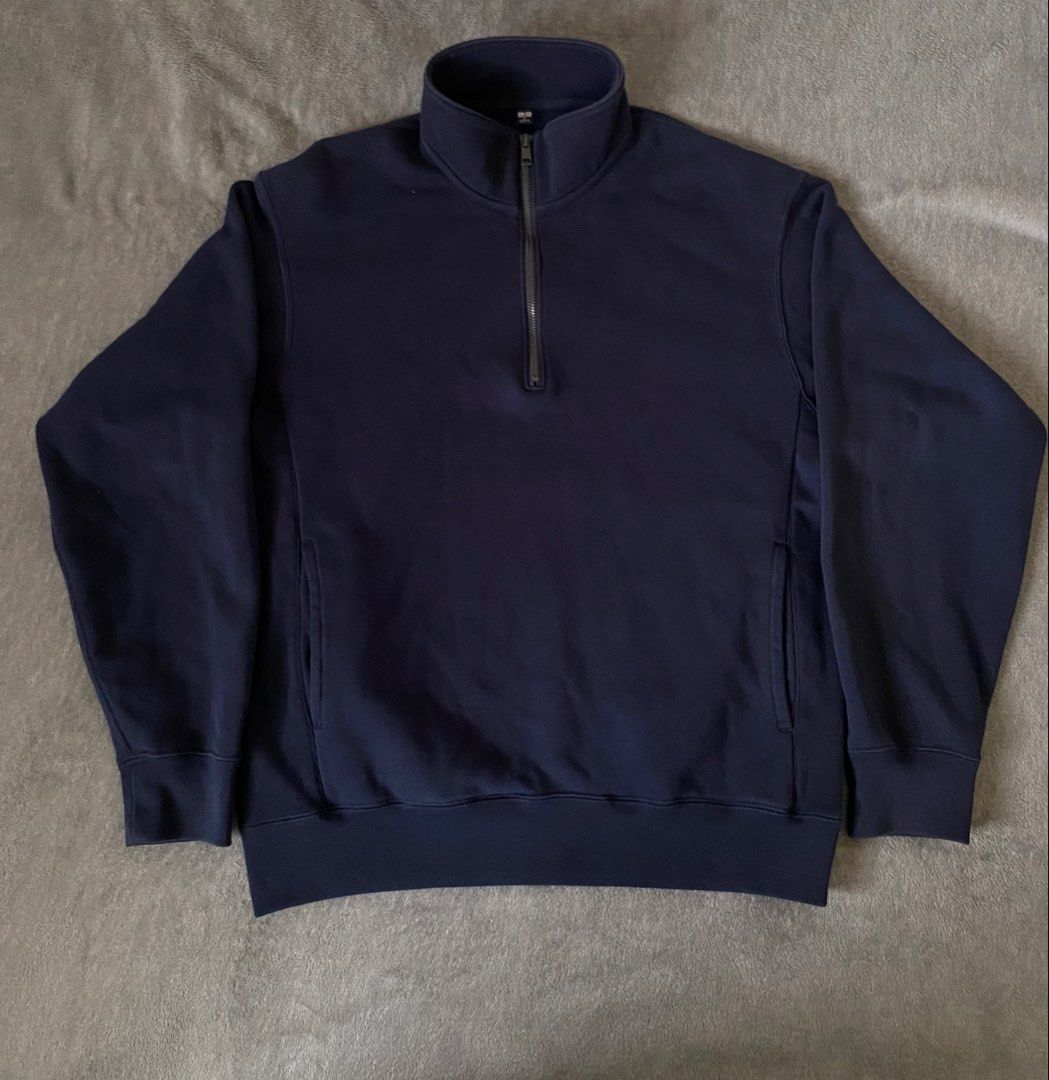 Uniqlo Navy Blue Half Zip Sweatshirt (Category: Coats, Jackets and Outerwear) located in Barili. Submitted by macheyzhackiel (Listing ID 1440776627, Image 1). Description: - Uniqlo Half Zip Sweatshirt - Color: Navy Blue - Material: Comfortable Cotton Blend - Features: Side Pockets - Versatile: Great for layering or wearing solo - Style: Easy to pair with casual outfits.