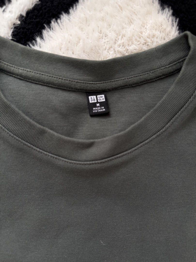 Uniqlo Olive Baby Tee (Category: Shirts) located in Dumaguete. Submitted by whimsyqueen03 (Listing ID 1440796932, Image 3). Description: • Dark green baby tee / muted olive tone • Soft, comfy & easy everyday staple • Minimal clean-girl / effortless vibe • Easy to pair with cargos, denim, skirts & basics • Closet essential piece ♡.