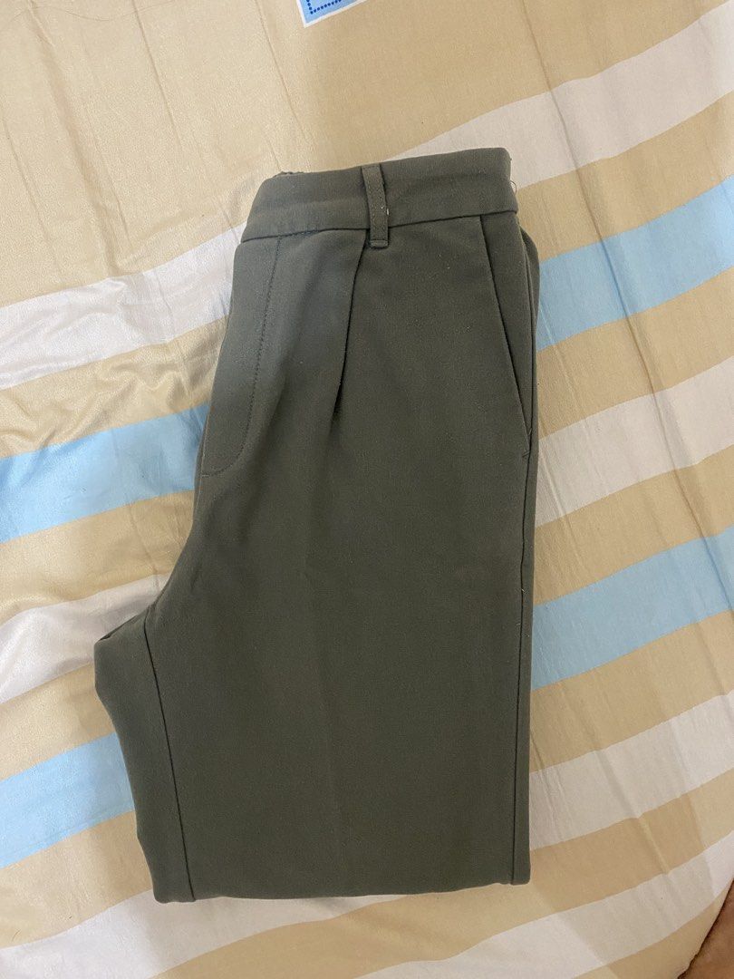Uniqlo/GU Trouser (Category: Other Bottoms) located in San Jose. Submitted by justcherry (Listing ID 1440890267, Image 2). Description: - 350 each - Colors: Muted Olive Green - Design: Pleated front - Comfort: Elasticated back waistband - Versatile: Ideal for casual and smart-casual outfits - Easy to style with various tops.