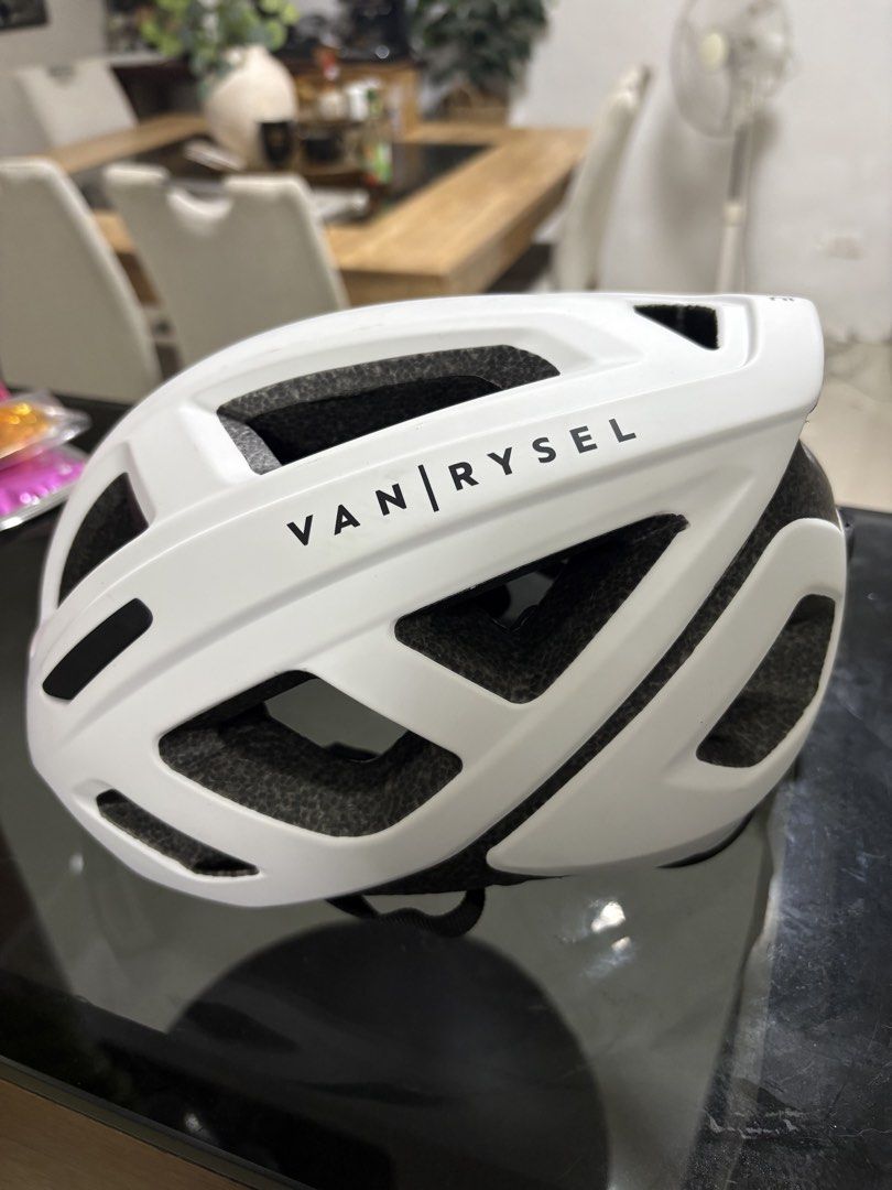 Van Rysel Cycling Helmet White (Category: Bicycles) located in Bacoor. Submitted by tin_02 (Listing ID 1440889552, Image 1). Description: - Rysel cycling helmet - Excellent ventilation with large vents - Adjustable strap and rear dial for a secure fit -With box -Used twice -Size Medium.