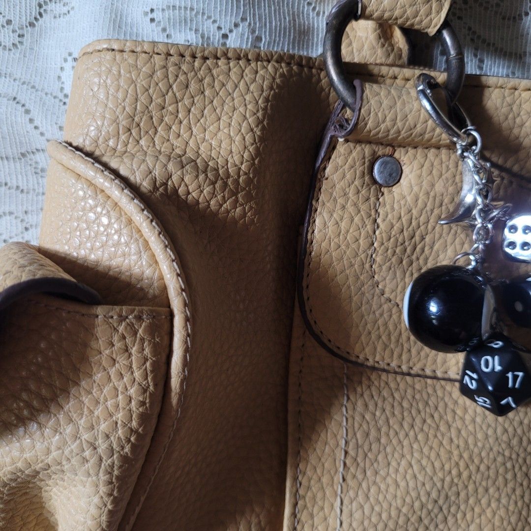vintage mendrez shoulder bag (Category: Shoulder Bags) located in Quezon City. Submitted by waks.archive (Listing ID 1440838733, Image 3). Description: authentic vintage mendrez pebbled in mustard tan / y2k utility / matrix grunge chic ​✦ condition: 8.5/10 [all zippers are functional. clean interior. minor naturall hardware oxidation. charms not included.].