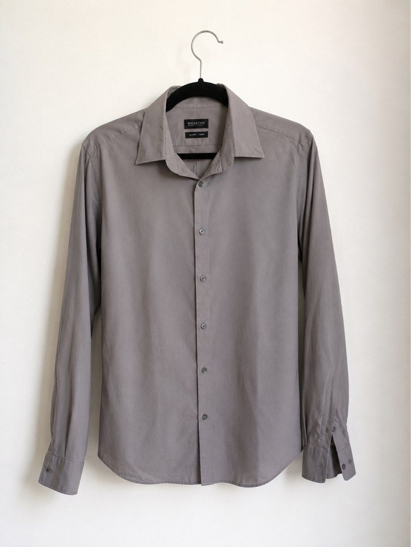 Wharton Executive Blue Chip Gray Long Sleeves (Category: Formal Shirts) located in Manila. Submitted by miafagg0th (Listing ID 1412188895, Image 1). Description: - Wharton Executive long-sleeved shirt - Solid gray color - Button-down front - Classic collar.