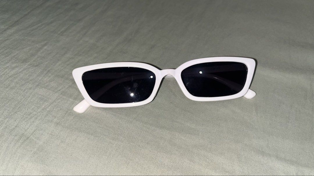 White Cat Eye Sunglasses with Black Lenses (Category: Sunglasses & Eyewear) located in Makati City. Submitted by madwear___ (Listing ID 1440944726, Image 2). Description: 🌀 10/10 condition; no issues 🪷 modes of payment: gcash, maya, chinabank, and unionbank :) 🍀 shipping fee must be paid by buyer; same day delivery is possible 💠 color may vary due to lighting ‼️get all sunglasses for 800 pesos send a message for inquires! 🪄💌.