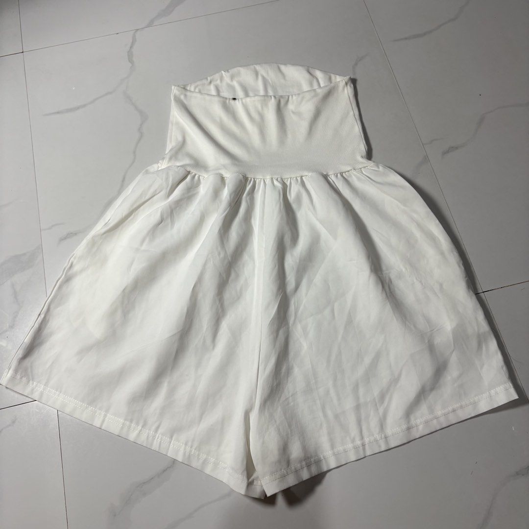 White Strapless Romper with Flowy Skirt (Category: Rompers) located in Magalang. Submitted by dclutter_ki (Listing ID 1440935124, Image 1). Description: Medium on tag pero keri hanggang large body frame. Worn once lang. Orig price is 300+ and this color is currently sold out. MOP: GCash/Maribank/Maya (payment first and no rush shipping fls).