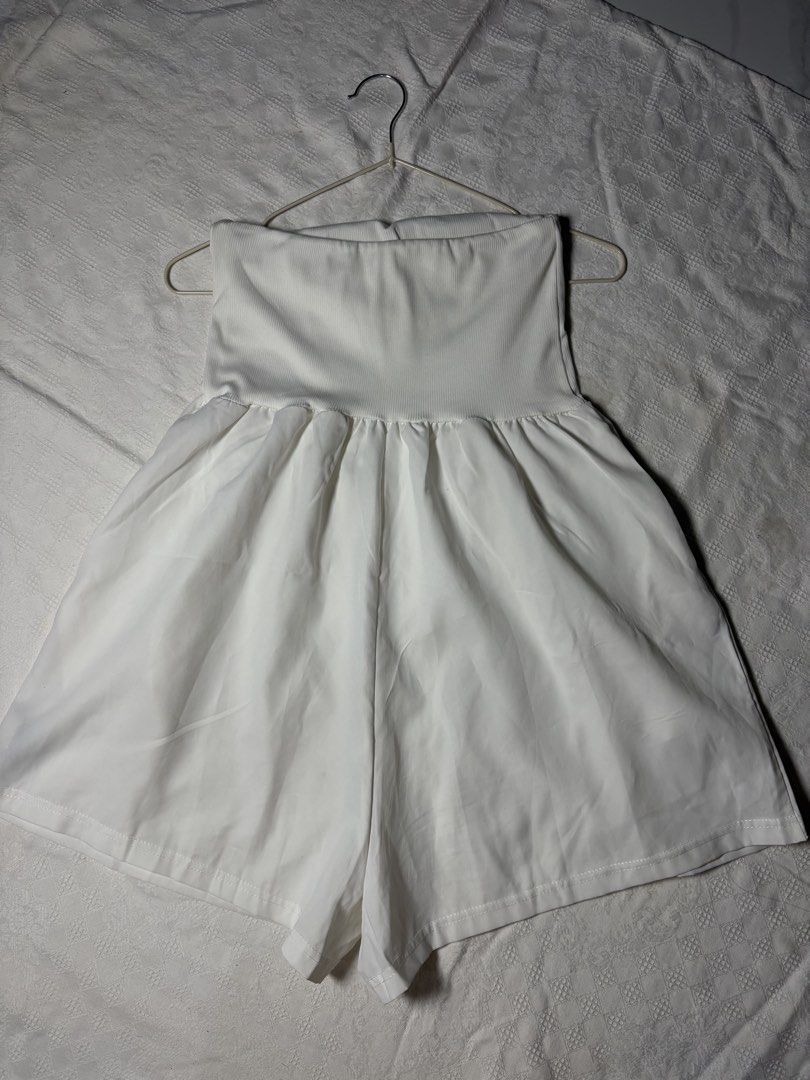 White Strapless Romper with Flowy Skirt (Category: Rompers) located in Magalang. Submitted by dclutter_ki (Listing ID 1440935124, Image 3). Description: Medium on tag pero keri hanggang large body frame. Worn once lang. Orig price is 300+ and this color is currently sold out. MOP: GCash/Maribank/Maya (payment first and no rush shipping fls).
