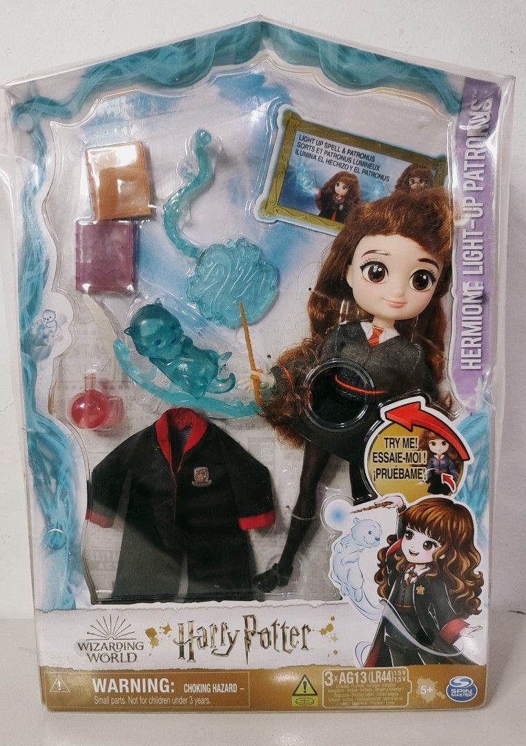 Wizarding World: Hermoine Grander Doll Light-Up Patronus MISB (Category: Figurines & Statues) located in Manila. Submitted by tddrop (Listing ID 1440865491, Image 1). Description: Wizarding World: Hermoine Grander Doll Light-Up Patronus MISB Expecto Patronum! Bring Hermione's Patronus to life and pretend to cast spells with the Wizarding World Hermione Light-up Patronus 8-inch doll! With seven accessories, including an attachable spell shield and