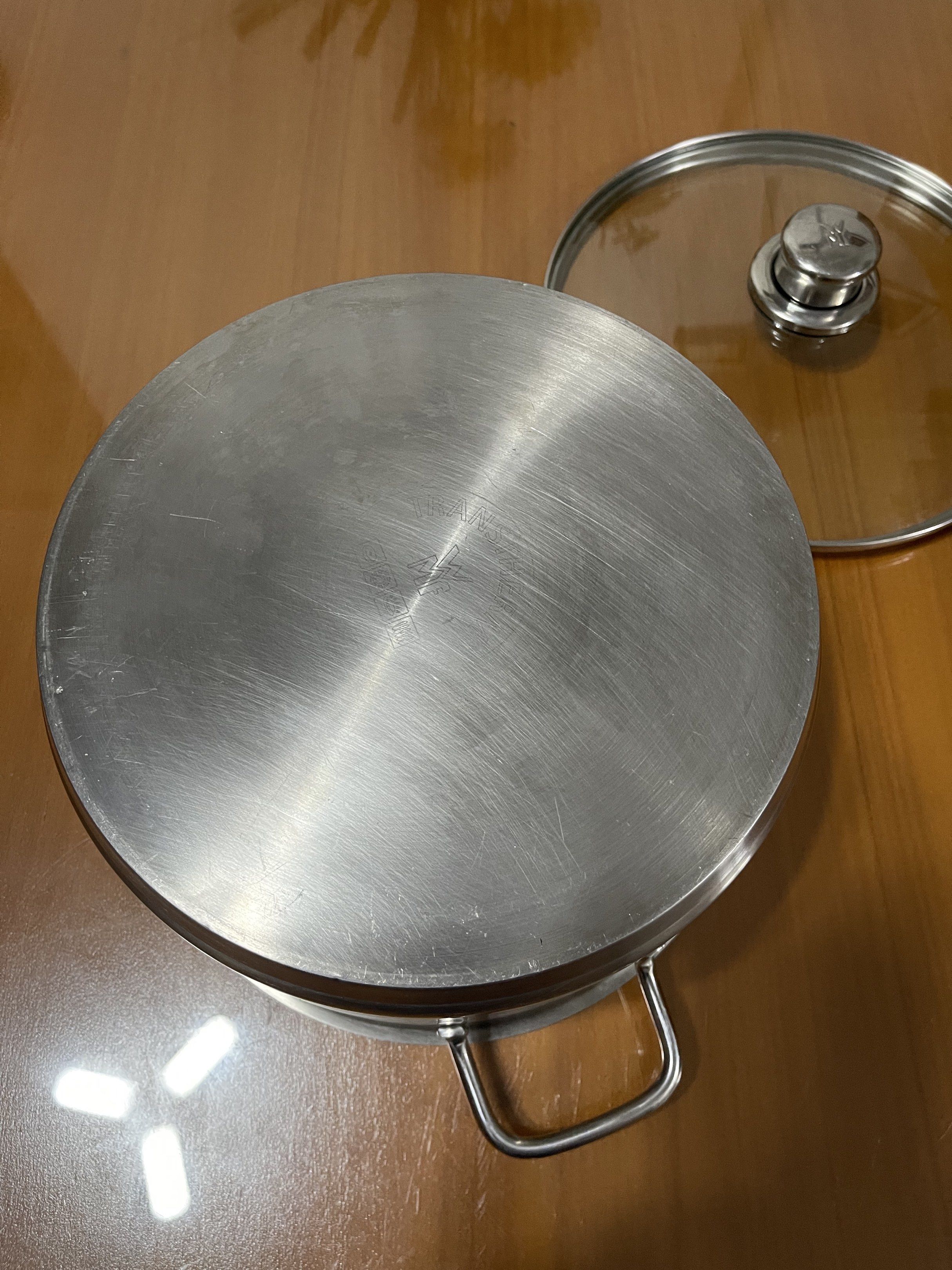WMF Transtherm Stainless Steel Pot 24cm (Category: Cookware & Accessories) located in Quezon City. Submitted by doublelkitchenwares (Listing ID 1440868359, Image 3). Description: WMF Transtherm Stainless Steel Pot with original cover Germany Brand Stainless Steel 18/10 24x14cm Induction / Gas / Electric Makapal and mabigat Minimal sign of usage, with minimal dent sa cover Pick up or shipping via lalamove Provincial 🚚j&t Novaliches Qc.