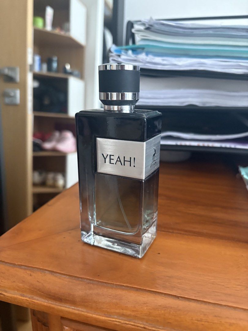YEAH! Perfume for Men (Category: Fragrance & Deodorants) located in Singapore. Submitted by hooper09 (Listing ID 1440785317, Image 1). Description: - YEAH! Eau de Parfum - Masculine scent - Sleek black bottle with silver accents - Suitable for daily wear and special occasions - Bottle is mostly full.