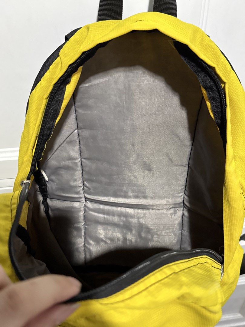 Yellow Jansport Backpack (Category: Backpacks) located in Quezon City. Submitted by itsbiancag (Listing ID 1440863976, Image 3). Description: Classic yellow Jansport backpack. Main compartment and front pocket. Straps are adjustable. Some marks on the back straps, check photos. Good for school or everyday use..
