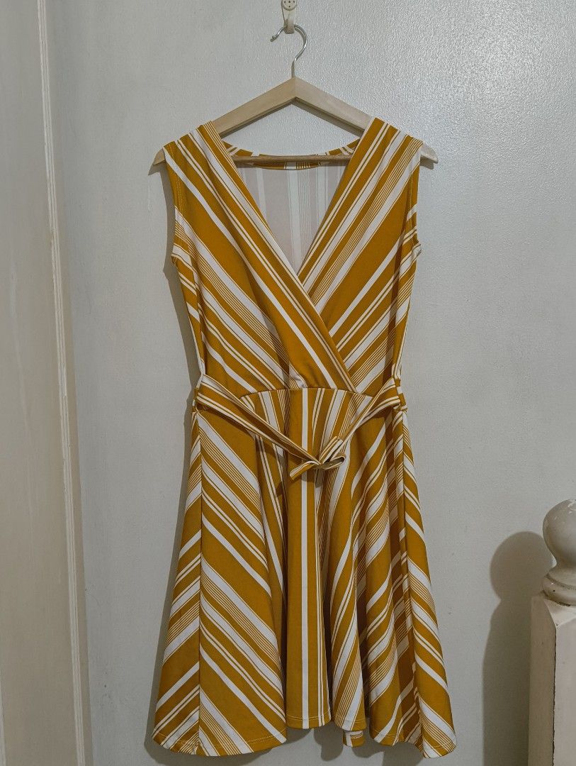 Yellow Retro Dress (Category: Dresses) located in Quezon City. Submitted by afteruse (Listing ID 1440892817, Image 1). Description: - No brand - Made of polyester - Has cute round buckle in front - Fits medium DM for specs!.