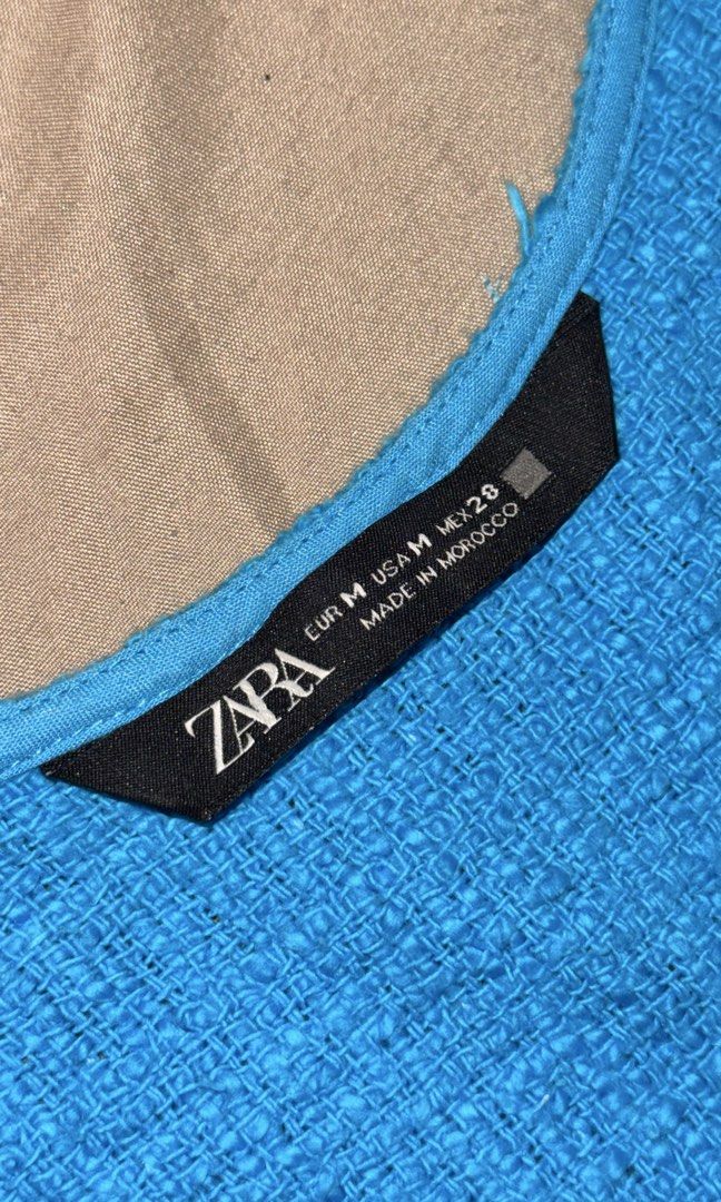 Zara Blue Textured Sleeveless Button Front Dress (Category: Dresses) located in Manila. Submitted by flyingyvon (Listing ID 1440879287, Image 2). Description: - Zara blue textured sleeveless dress - V-neckline with button front detail .