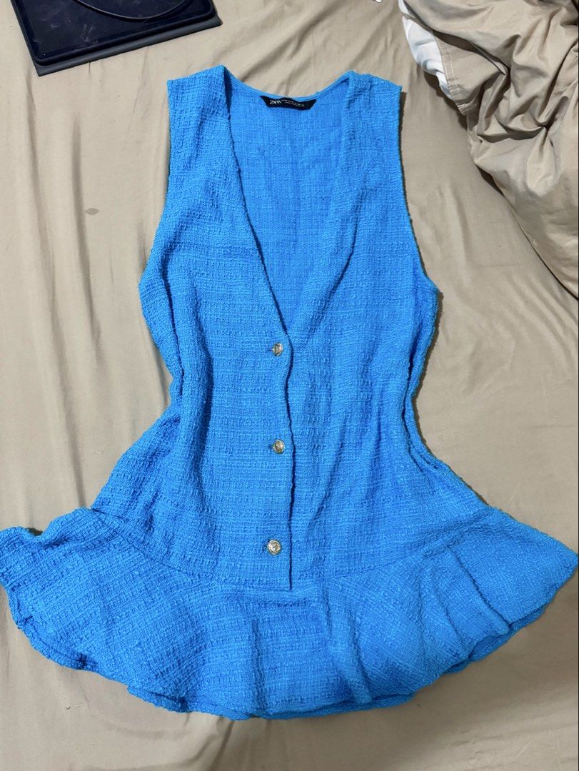 Zara Blue Textured Sleeveless Button Front Dress (Category: Dresses) located in Manila. Submitted by flyingyvon (Listing ID 1440879287, Image 1). Description: - Zara blue textured sleeveless dress - V-neckline with button front detail .