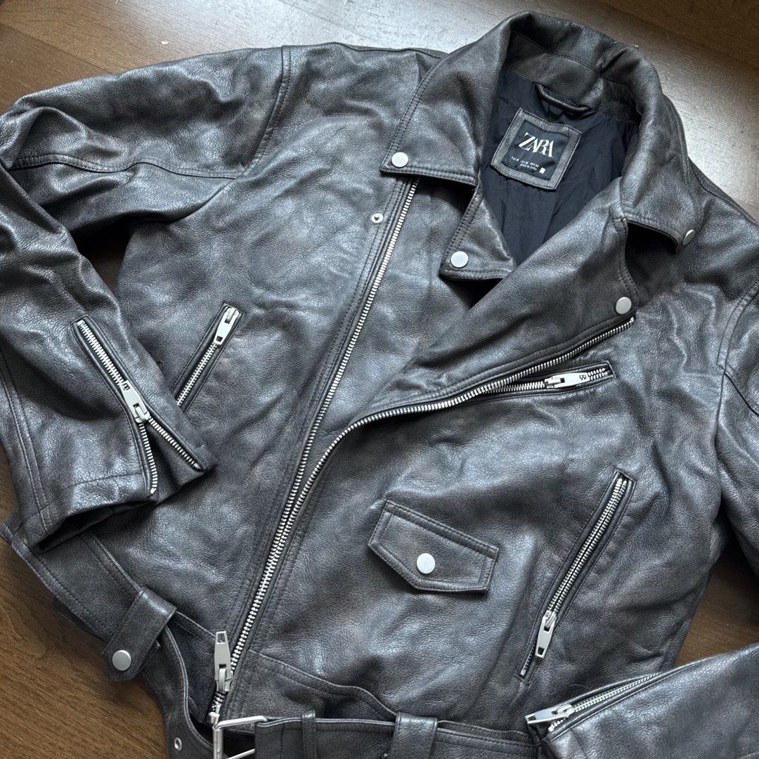 Zara Faux Leather Biker Jacket (Category: Coats, Jackets and Outerwear) located in Manila. Submitted by myclosetstylist (Listing ID 1440776624, Image 2). Description: - Zara cool grey faux leather biker jacket - Classic moto style - Features zip details and a belt - Acne Studios vibe.