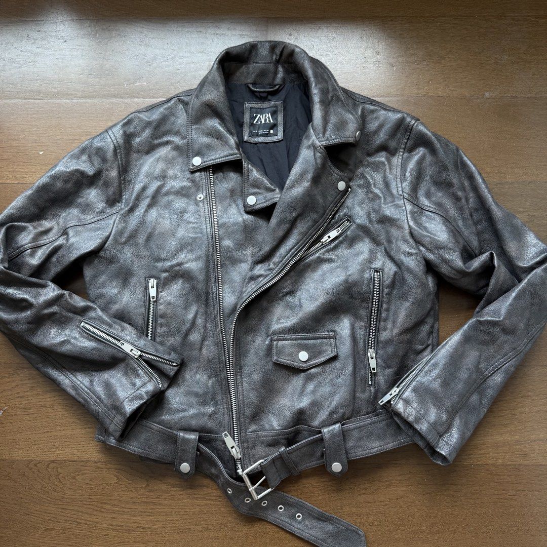 Zara Faux Leather Biker Jacket (Category: Coats, Jackets and Outerwear) located in Manila. Submitted by myclosetstylist (Listing ID 1440776624, Image 1). Description: - Zara cool grey faux leather biker jacket - Classic moto style - Features zip details and a belt - Acne Studios vibe.