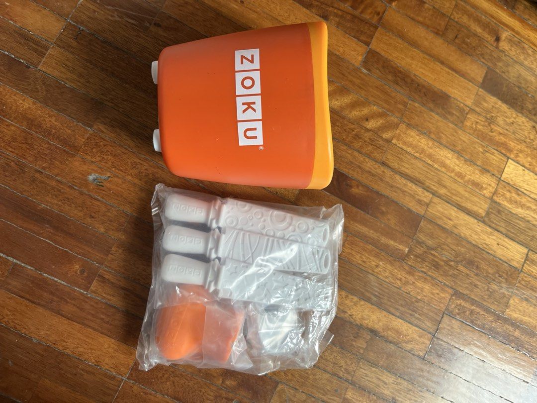 Zoku Quick Ice Pop Maker (Category: Other Kitchenware & Tableware) located in Muntinlupa City. Submitted by projectnoclutter (Listing ID 1440808104, Image 1). Description: - Brand: Zoku - Product: Quick Ice Pop Maker - Color: Orange - Features: Makes pops quickly, includes pop sticks - Condition: Good as shown in photos - Perfect for homemade frozen treats.