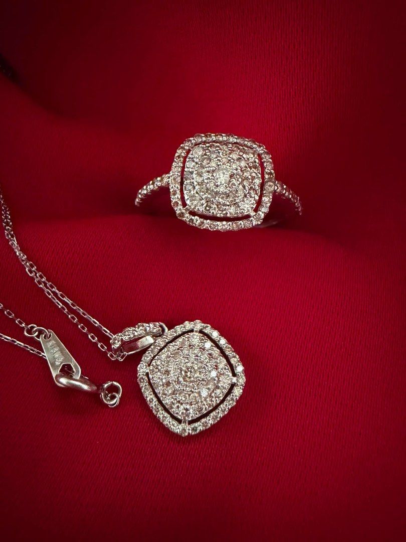 18K White Gold Diamond Ring and Pendant Set (Category: Necklaces) located in San Pedro. Submitted by loveeofgoldiss (Listing ID 1440958555, Image 1). Description: - Exquisite 18K white gold set - Features a dazzling square halo design with diamonds - Includes a matching ring and pendant - Pendant is suspended on a delicate white gold chain - Clasp is clearly marked 'K18' - Versatile for both everyday elegance and special events.