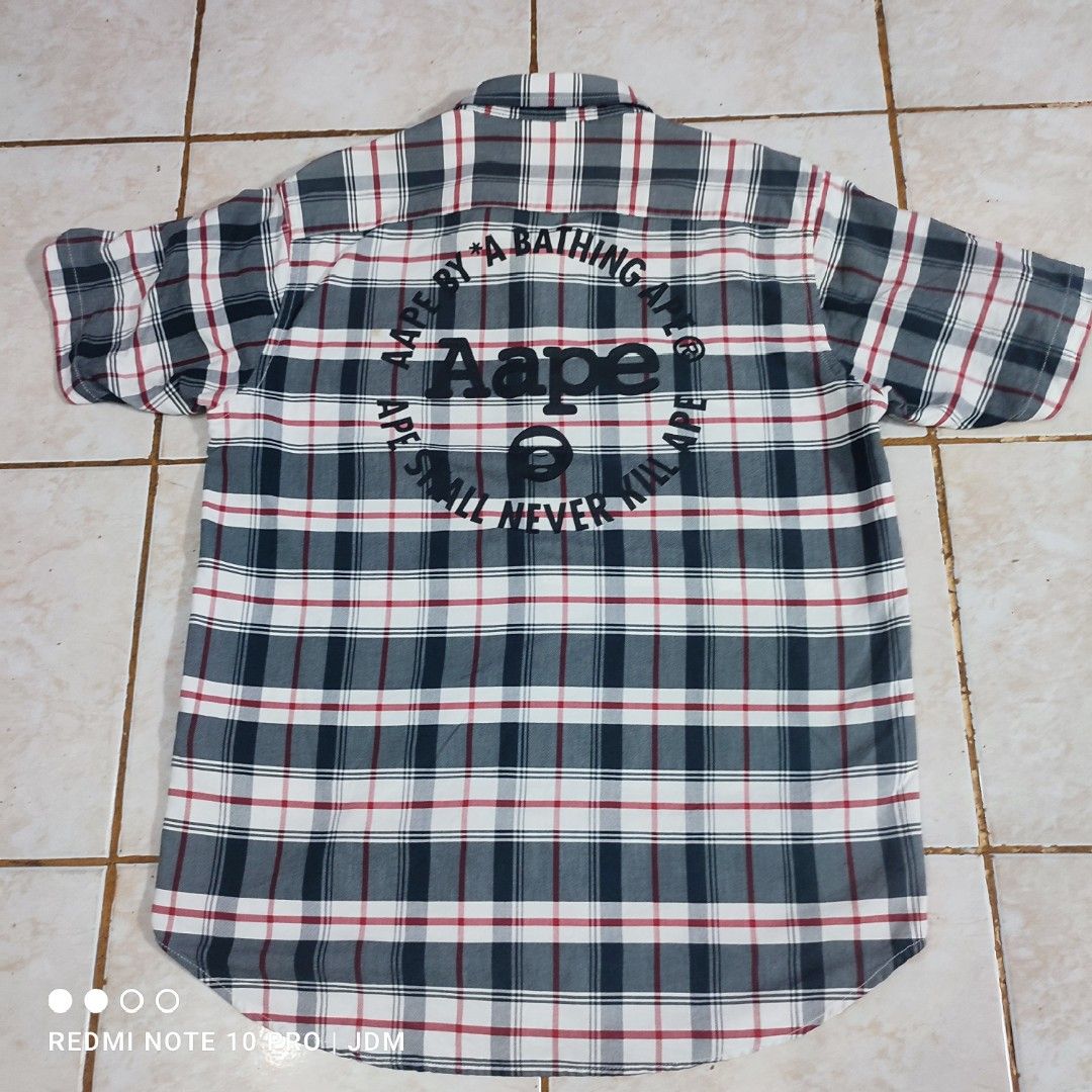AAPE Polo shirt (Category: Tshirts & Polo Shirts ) located in Antipolo. Submitted by klashnikov (Listing ID 1441066551, Image 2). Description: Size:Medium on tag Dimes:W20.5"xL28" Tags:Complete Condition: Very Good Honest issue: slight discoloration on collar fold( hindi halata pag nakatupi) Payment option:Bank transfer,gcash,cash 1000php onlyn Pwede videocall for legitimacy Pls. Check my sellers feedback (marketplace) for peace of mind in buying