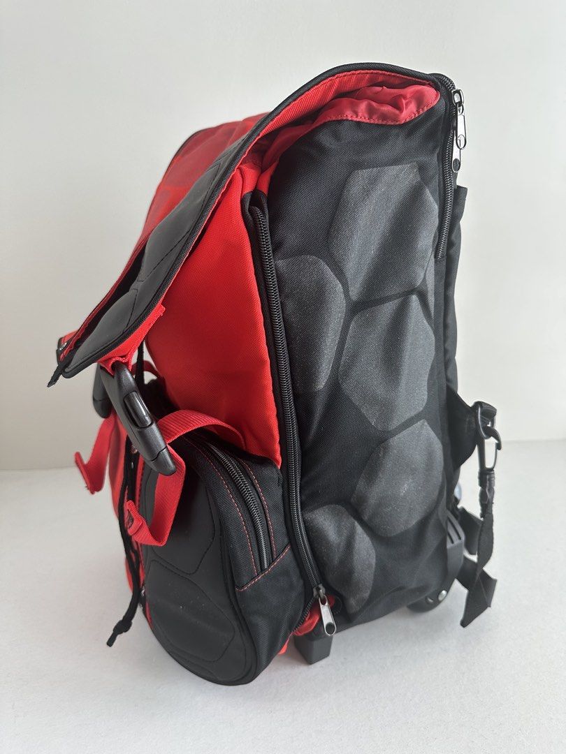 AC Milan Red Black Trolley Backpack (Category: Backpacks) located in Manila. Submitted by monica515 (Listing ID 1441001296, Image 2). Description: - Size: approx 12”w x 17”h x 6”d - Has a built-in collapsible handle that can turn into a trolley - Spacious main compartment - Convenient front pockets - Adjustable straps for comfortable wear - Shows some signs of wear, but fully functional .
