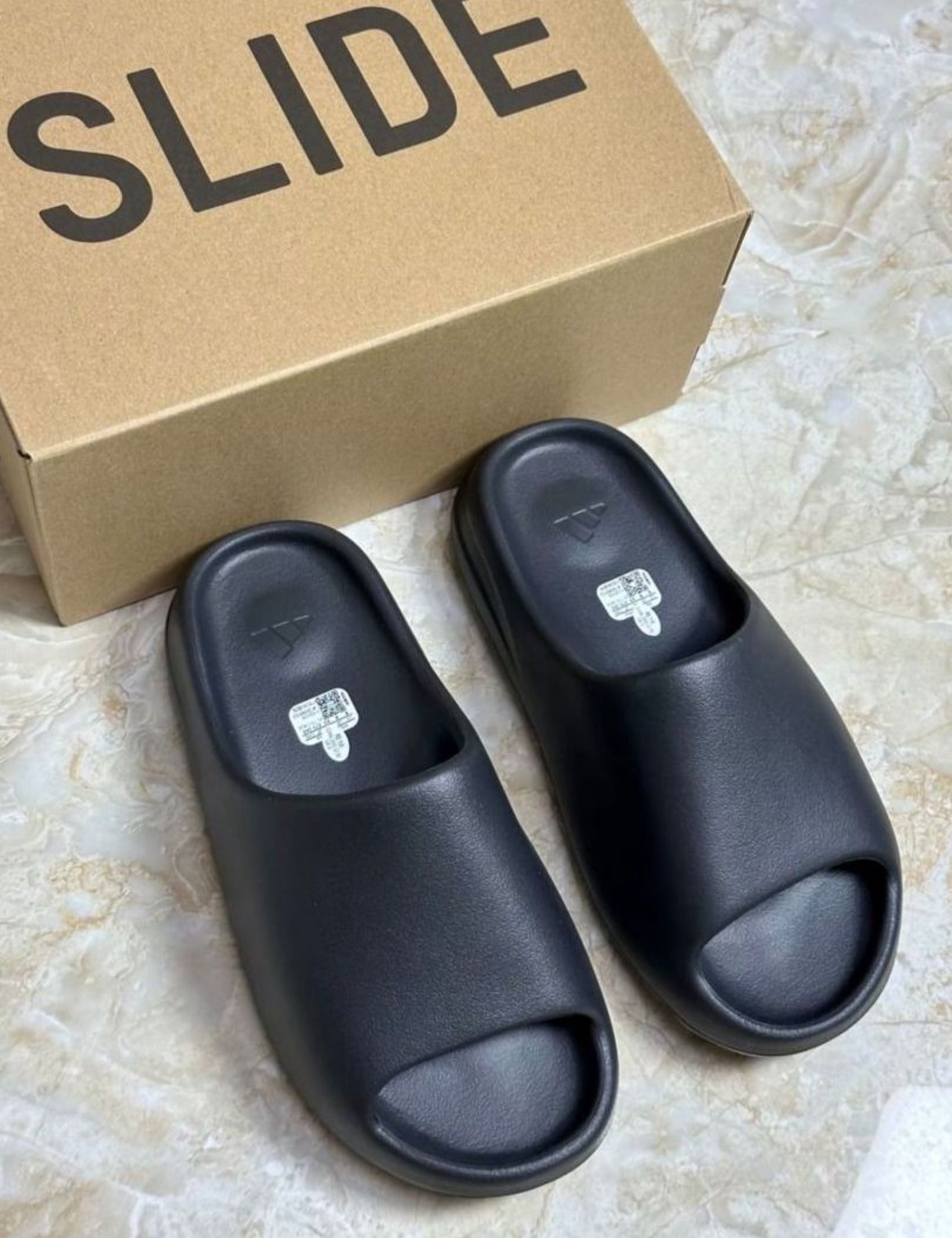 adidas originals Yeezy Slide Slippers Black (Category: Sneakers) located in Singapore. Submitted by muredolphin (Listing ID 1441087350, Image 3). Description: Hi! Adidas adidas originals Yeezy Slide Slippers Black now available 📢 ✅ Brand new 📸 Photos sent in ~3 days to confirm 🚛 Free shipping via J&T/Ninja Van 💰 Cash on delivery Chat me for sizes & availability 💬.
