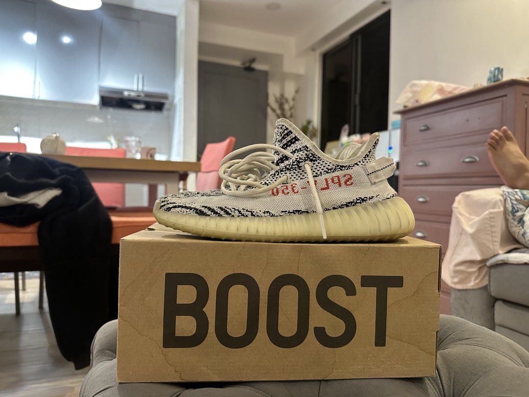 Adidas Yeezy Boost 350 V2 Zebra (Category: Sneakers) located in Quezon City. Submitted by niles.yuson (Listing ID 1441000146, Image 1). Description: - Adidas Yeezy Boost 350 V2 Zebra - Comes with original box (Damaged) - Size 8.5 - 7/10 Condition (See pictures) - Will nego for sure buyer .