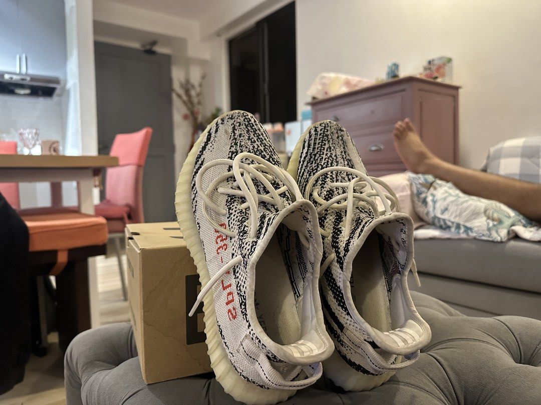 Adidas Yeezy Boost 350 V2 Zebra (Category: Sneakers) located in Quezon City. Submitted by niles.yuson (Listing ID 1441000146, Image 2). Description: - Adidas Yeezy Boost 350 V2 Zebra - Comes with original box (Damaged) - Size 8.5 - 7/10 Condition (See pictures) - Will nego for sure buyer .
