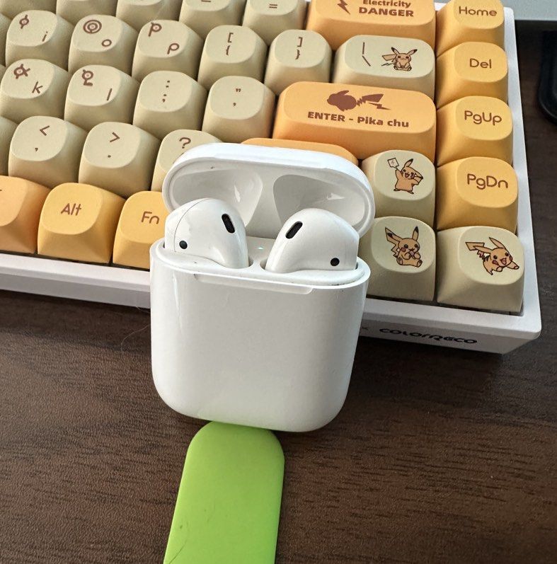 Airpods Gen 2 (Category: Earphones) located in Singapore. Submitted by tossim01 (Listing ID 1441032356, Image 1). Description: Used Apple AirPods Gen 2 for sale. ✅ Fully functional, no issues at all — audio, mic, and Bluetooth work perfectly. ✅ Battery life is still good for daily use. ✅ No major scratches or damage on the earbuds or case (normal wear expected). Comes with: • ✅ Original AirPods Gen 2 charging case • ✅ A free silicone protective c