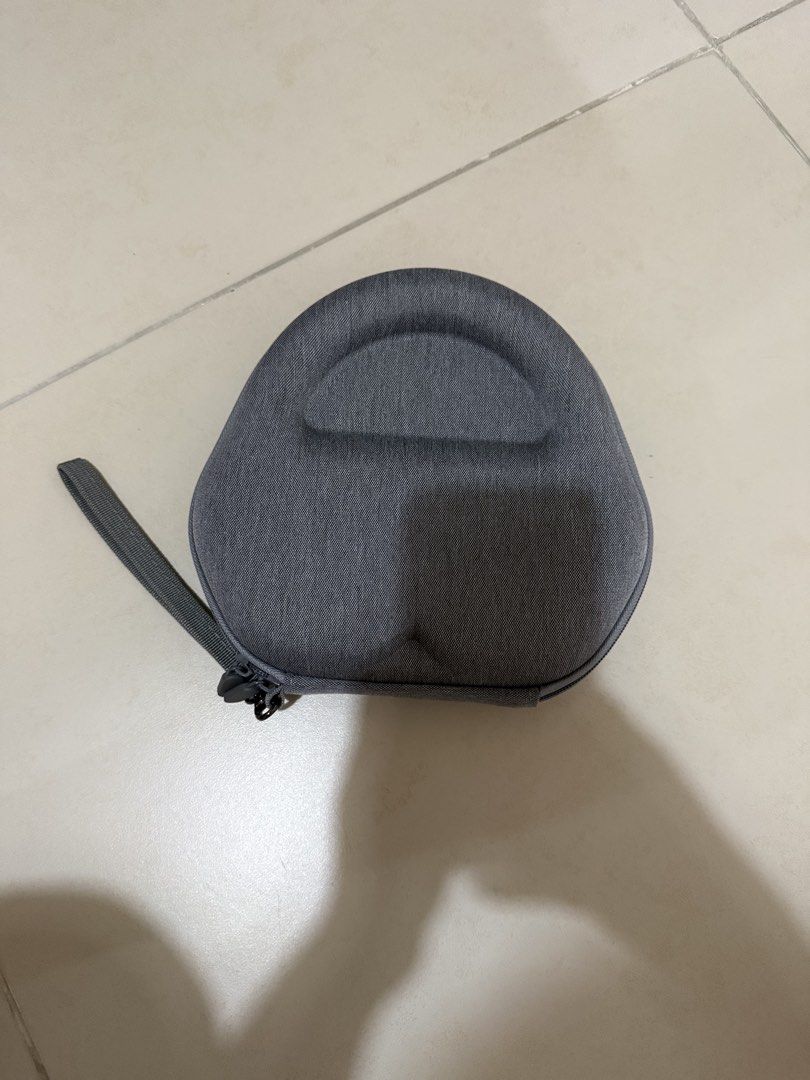 Airpods Max Grey Hard Shell Headphone Carrying Case with Handle (Category: Headphones & Headsets) located in Mandaluyong City. Submitted by mntssapdrns (Listing ID 1441119903, Image 1). Description: - Grey hard shell case for headphones - Sturdy zipper closure - Convenient carrying handle - Soft and padded interior for protection - Fits most over-ear headphone models - Perfect for travel and safe storage.