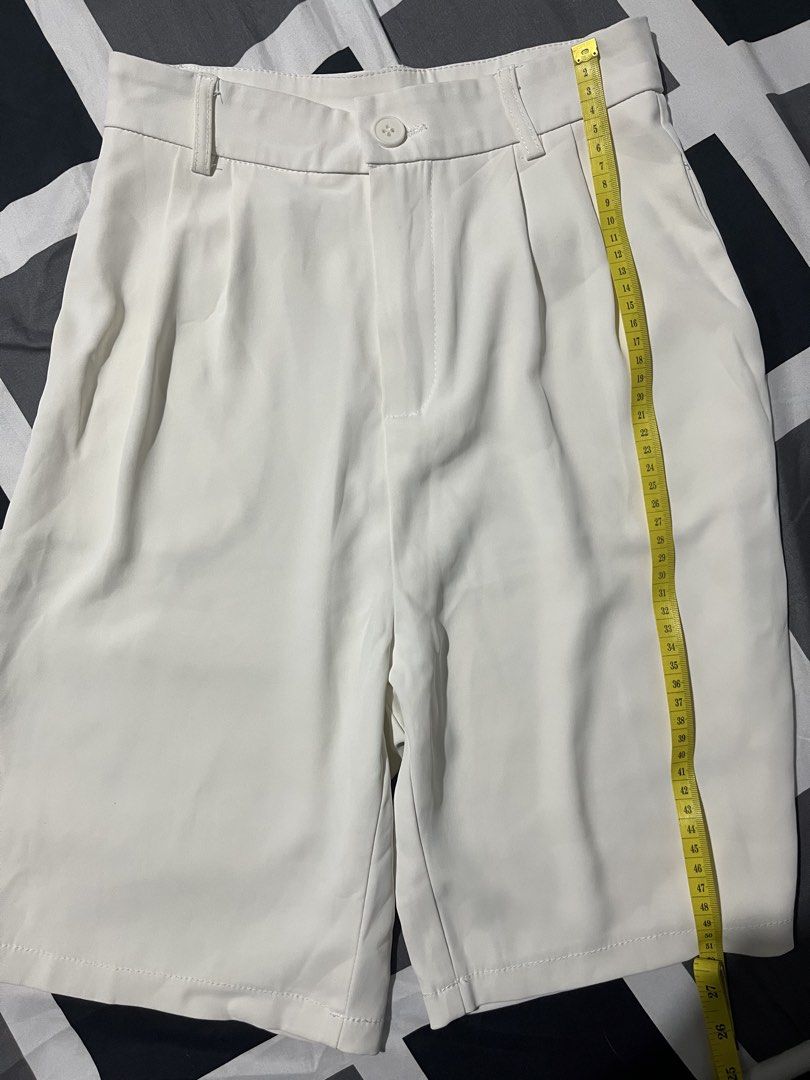 AKKS Studio Cream Pleated High Waisted Shorts (Category: Shorts) located in Manila. Submitted by hi_abbd (Listing ID 1440968513, Image 3). Description: - Brand: AKKS Studio - Color: Cream - Style: High-waisted shorts with front pleats - Closure: Zipper and button - Length: Knee-length - Versatile: Great for casual or smart-casual outfits - Sizing: Measurements available in photos Never worn.