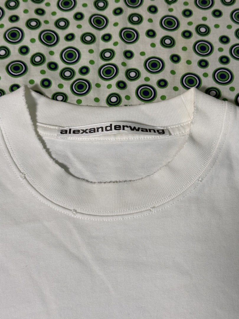 Alexande Wang Distressed shirt (Category: Tshirts & Polo Shirts ) located in Quezon City. Submitted by dailyfits08 (Listing ID 1441115253, Image 3). Description: Size XL Excellent Width 24.5 Length 30 Washable dirt inside hem(last photo).