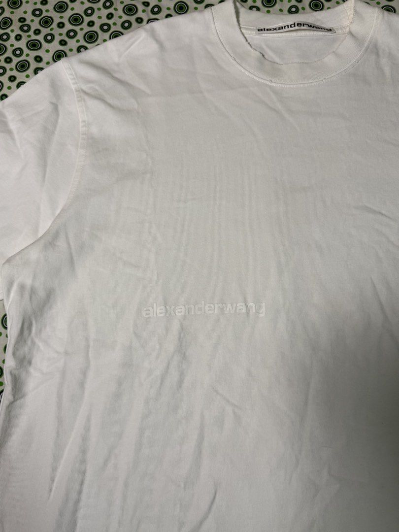 Alexande Wang Distressed shirt (Category: Tshirts & Polo Shirts ) located in Quezon City. Submitted by dailyfits08 (Listing ID 1441115253, Image 2). Description: Size XL Excellent Width 24.5 Length 30 Washable dirt inside hem(last photo).