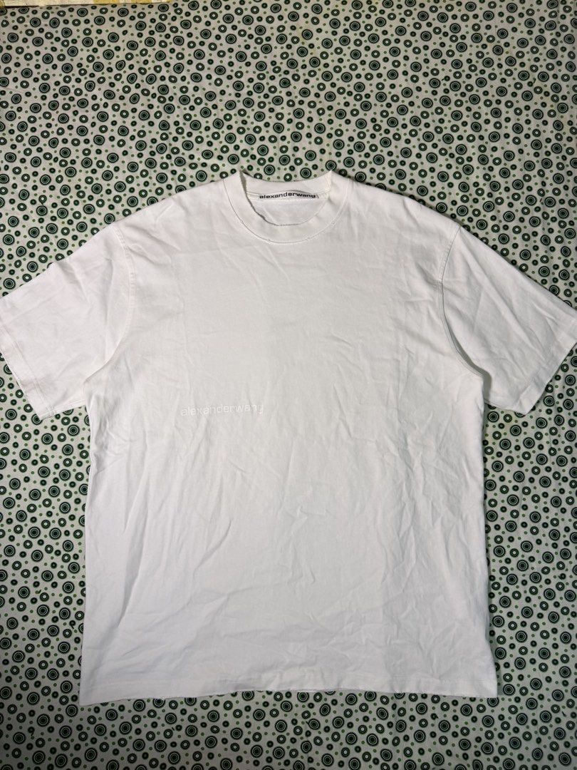 Alexande Wang Distressed shirt (Category: Tshirts & Polo Shirts ) located in Quezon City. Submitted by dailyfits08 (Listing ID 1441115253, Image 1). Description: Size XL Excellent Width 24.5 Length 30 Washable dirt inside hem(last photo).