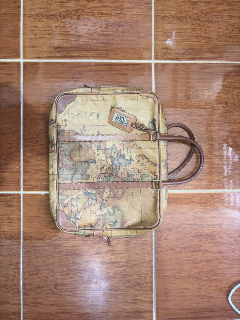 Alviero Martini Prima Classe world map briefcase (Category: Luxury Bags & Wallets) located in Manila. Submitted by tryke98 (Listing ID 1440999972, Image 1). Description: Alviero Martini luxury bag.