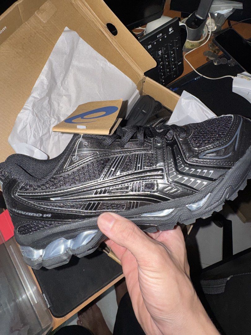 ASICS Gel-Kayano 14 Black Silver Running Shoes (Category: Sneakers) located in Singapore. Submitted by repstudio (Listing ID 1441022833, Image 1). Description: - ASICS Gel-Kayano 14 - Colorway: Cream/Black - Size: Men's US 9.5 / Women's US 11 - Condition: Excellent, with original box - Features: Comfortable, supportive - Ideal for: Running, everyday wear.