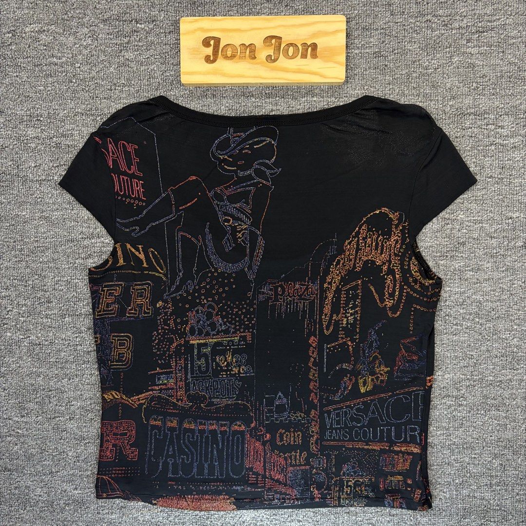 (Sale) (Authentic) Versace Neon Casino (Category: Luxury Apparel) located in Cavite. Submitted by onebeancent (Listing ID 1441064028, Image 2). Description: 🔘Authentic Versace Neon Casino Style Size: Small to Medium (Women) Dimension: 17" Width | 19" Length Color: Black Color Rate:10/10 Issue: See last pic medyo na stretch yung banda sa shoulder Condition: Excellent overall Price: 999php Additional Shipping Fee (J&T Small Pouch) 75php Luzon 100p