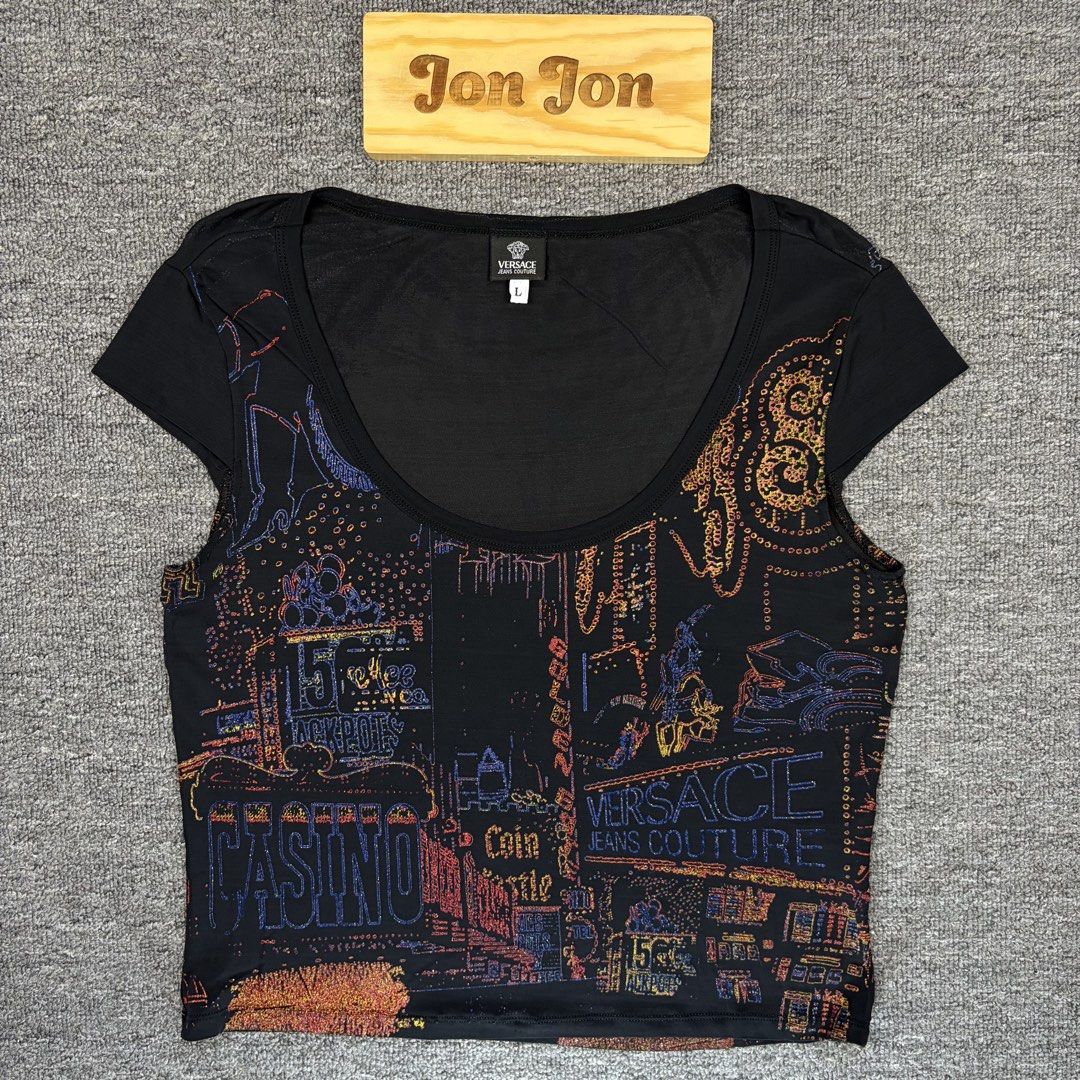 (Sale) (Authentic) Versace Neon Casino (Category: Luxury Apparel) located in Cavite. Submitted by onebeancent (Listing ID 1441064028, Image 1). Description: 🔘Authentic Versace Neon Casino Style Size: Small to Medium (Women) Dimension: 17" Width | 19" Length Color: Black Color Rate:10/10 Issue: See last pic medyo na stretch yung banda sa shoulder Condition: Excellent overall Price: 999php Additional Shipping Fee (J&T Small Pouch) 75php Luzon 100p