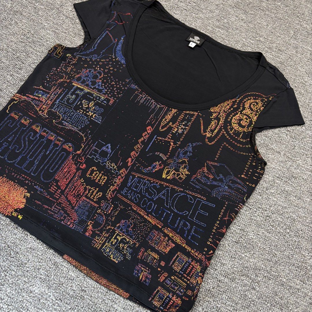 (Sale) (Authentic) Versace Neon Casino (Category: Luxury Apparel) located in Cavite. Submitted by onebeancent (Listing ID 1441064028, Image 3). Description: 🔘Authentic Versace Neon Casino Style Size: Small to Medium (Women) Dimension: 17" Width | 19" Length Color: Black Color Rate:10/10 Issue: See last pic medyo na stretch yung banda sa shoulder Condition: Excellent overall Price: 999php Additional Shipping Fee (J&T Small Pouch) 75php Luzon 100p