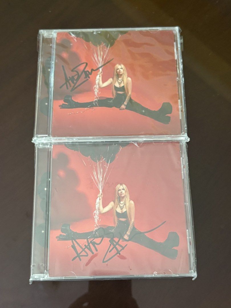 Avril Lavigne Love Sux Signed CD (Category: CDs & DVDs) located in Manila. Submitted by stefandraboutique (Listing ID 1440960662, Image 1). Description: - Authentic signed copies of Avril Lavigne's Love Sux CD. - Both CDs are brand new and still sealed. - A must-have for any dedicated Avril Lavigne fan. - Excellent addition to any music memorabilia collection. - Limited availability – don't miss out!.