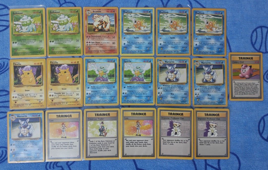Base Set Assorted (Category: Raw Cards) located in Singapore. Submitted by peter556699 (Listing ID 1441041162, Image 1). Description: Bulbasuar $6 Arcanine $6 Magikarp $6 Pikachu $8 Squirtle $8 Wartortle $8 Lass $6 Pokémon Trader $6 Imposter Professor Oak $8 Clefairy Doll $10 Smartpac +$3.