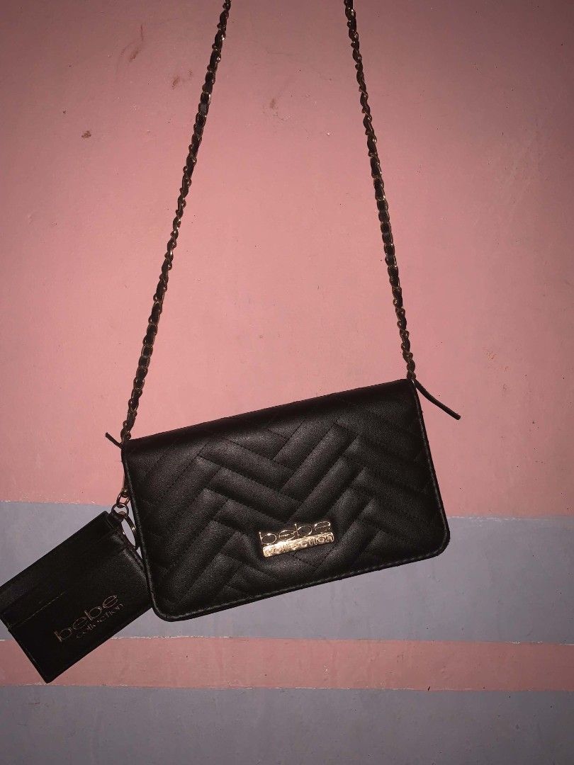 BEBE collection; blacksmall quilted crossbody bag (Category: Cross-body Bags) located in Manila. Submitted by alegue (Listing ID 1441094599, Image 1). Description: BEBE COLLECTION: (750-800 PHP ONLY!!) - Black quilted wallet clutch from Bebe Collection - Features a stylish gold chain strap - Comes with a convenient small cardholder •via lalamove delivery (around metro manila) •Payment via Gcash 📩 message for inquiry or questions.