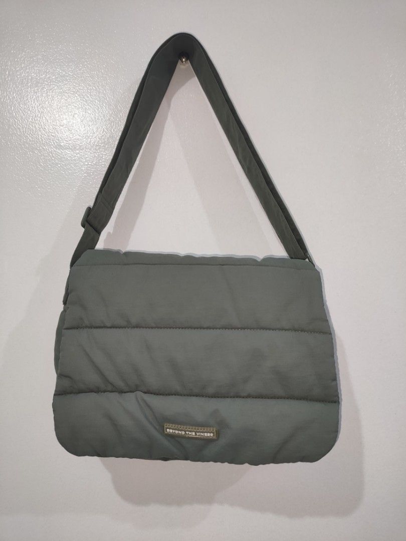 Beyond The Vines Poofy Shoulder Bag (Category: Shoulder Bags) located in Quezon City. Submitted by maxsab (Listing ID 1441083410, Image 1). Description: - Beyond The Vines Khaki Puffer Shoulder Bag - Soft and squishy material for ultimate comfort - Adjustable strap for a customized fit - Vibrant bright blue interior lining - Ample space for all your daily essentials - Ideal for everyday use.