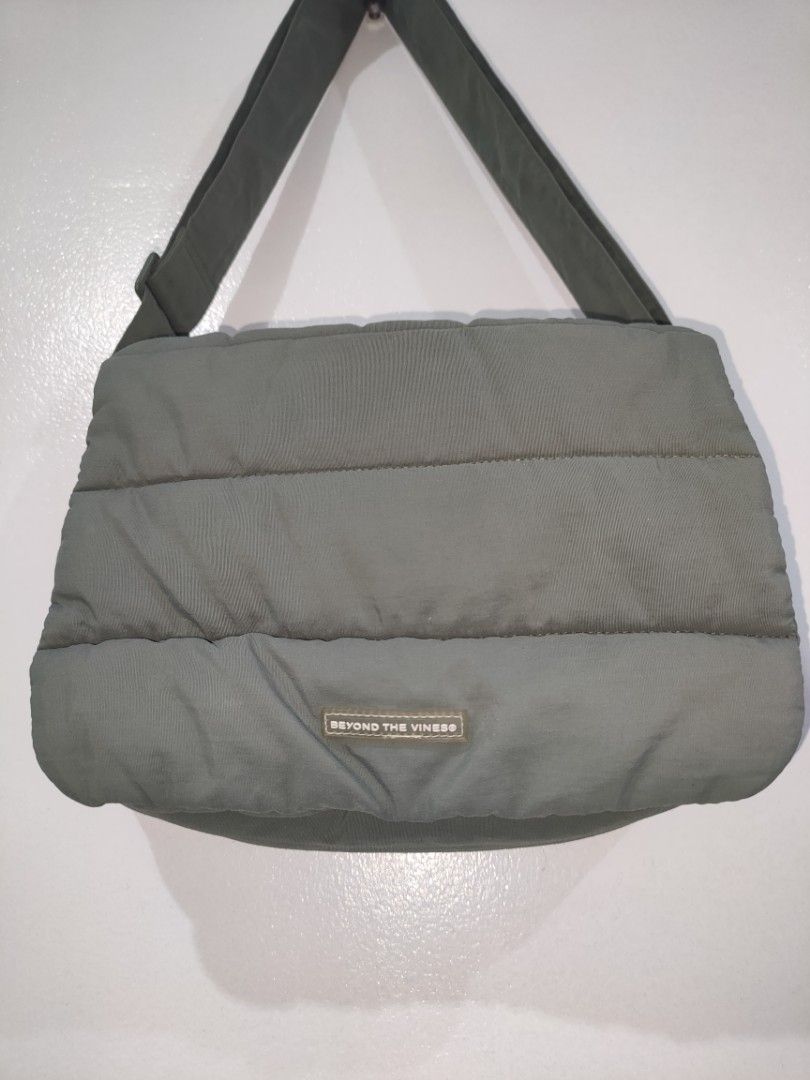 Beyond The Vines Poofy Shoulder Bag (Category: Shoulder Bags) located in Quezon City. Submitted by maxsab (Listing ID 1441083410, Image 2). Description: - Beyond The Vines Khaki Puffer Shoulder Bag - Soft and squishy material for ultimate comfort - Adjustable strap for a customized fit - Vibrant bright blue interior lining - Ample space for all your daily essentials - Ideal for everyday use.
