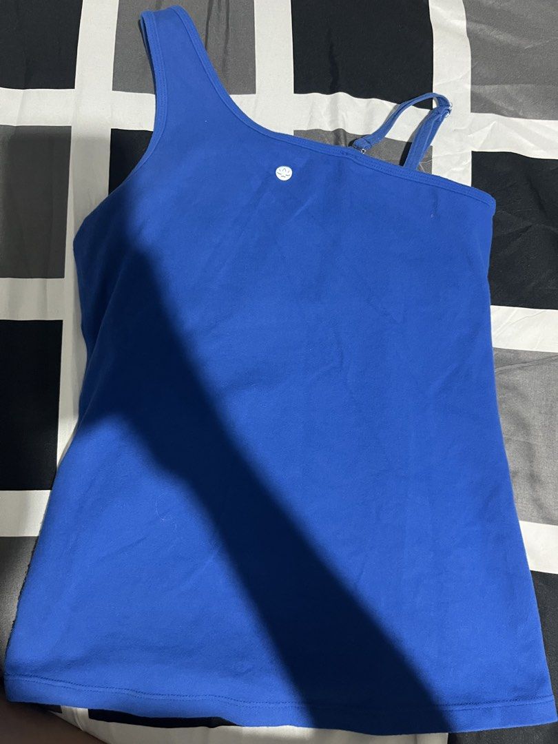 Beyond Yoga Blue One Shoulder Tank Top (Category: Activewear) located in Manila. Submitted by hi_abbd (Listing ID 1440971922, Image 3). Description: - Beyond Yoga blue one-shoulder tank top - Features an adjustable strap - Inner slogan: 'i am beyond... motivated' - Ideal for yoga and workouts - Comfortable and stylish design.