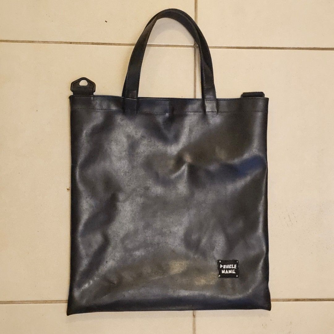 Black Pleather Tote Bag Laptop Bag (Category: Luxury Bags & Wallets) located in Silang. Submitted by monpeanut (Listing ID 1441027238, Image 1). Description: - Spacious main compartment - Approximate measurements: 16 inches tall, 15.5 inches wide - Handle drop: approximately 7 inches.