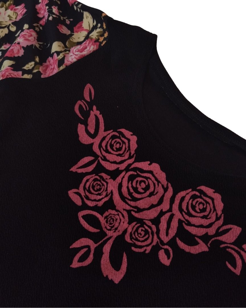 Black Top with Floral Bell Sleeves | Large (Category: Blouses) located in Manila. Submitted by ubes_corner (Listing ID 1441013205, Image 3). Description: - Stylish black top - Features pretty floral bell sleeves - Adorned with a rose design on the front - Peplum-style silhouette - Versatile for casual or dressed-up looks - Easily pairs with jeans or skirts.