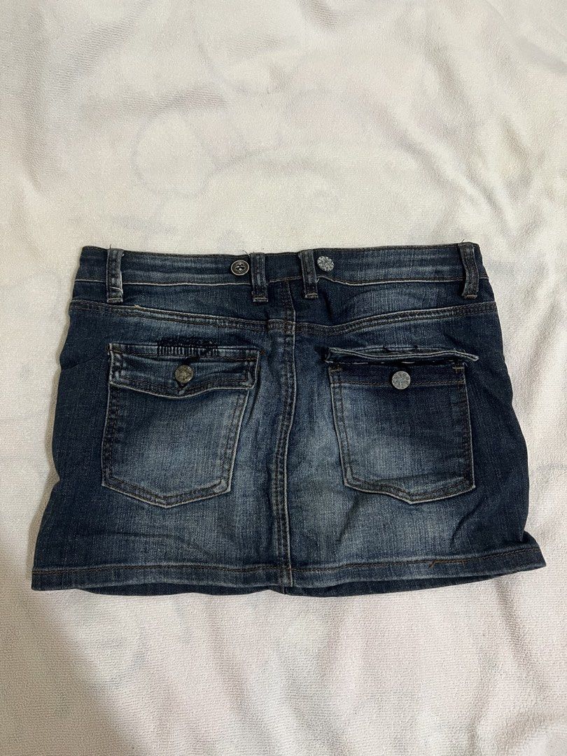 Blue Denim Mini Skirt with Pockets (Category: Skirts) located in Manila. Submitted by msgldn (Listing ID 1441039454, Image 2). Description: - Classic blue denim mini skirt - Front and back pockets - Button and zip closure - Distressed fabric detailing - Ideal for casual wear - Versatile for pairing with tops and shoes.